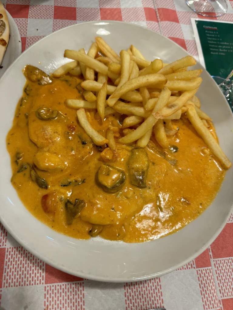 Chicken dish with fries at Mamma Pronto in Cadiz, Spain