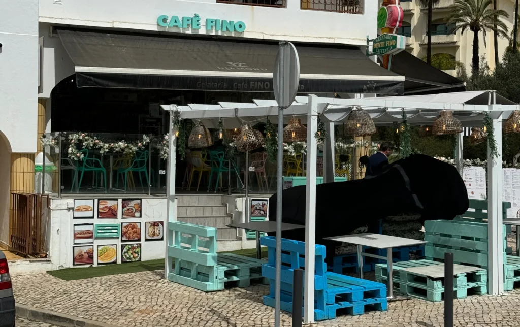 Storefront of Cafe Fino in Carvoeiro, Portugal
