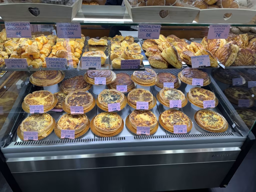 Pastry case full of empanadas and other gluten free savoury treats