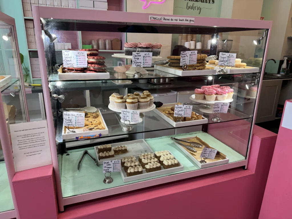 Pastry case at Sugar Daddy's Bakery in Edinburgh, Scotland