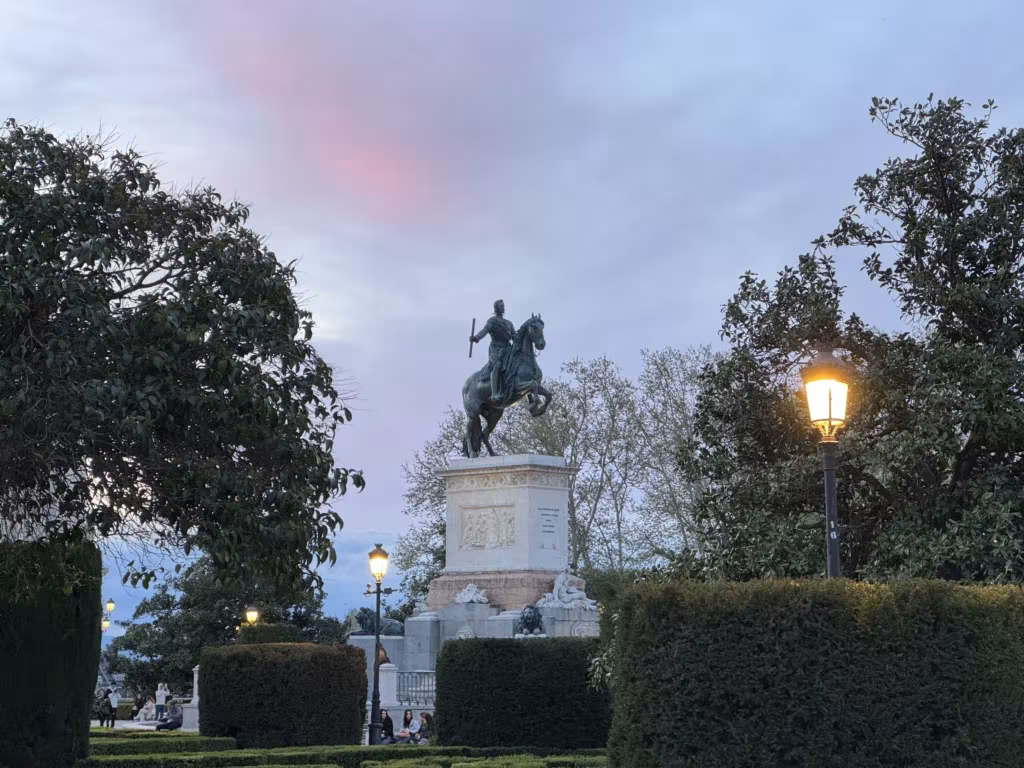 Statue in Plaza de Oriente at night in Madrid, Spain