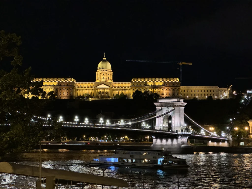 Buda Castle and Szechenyi Chain Bridge at night in Budapest, Hungary