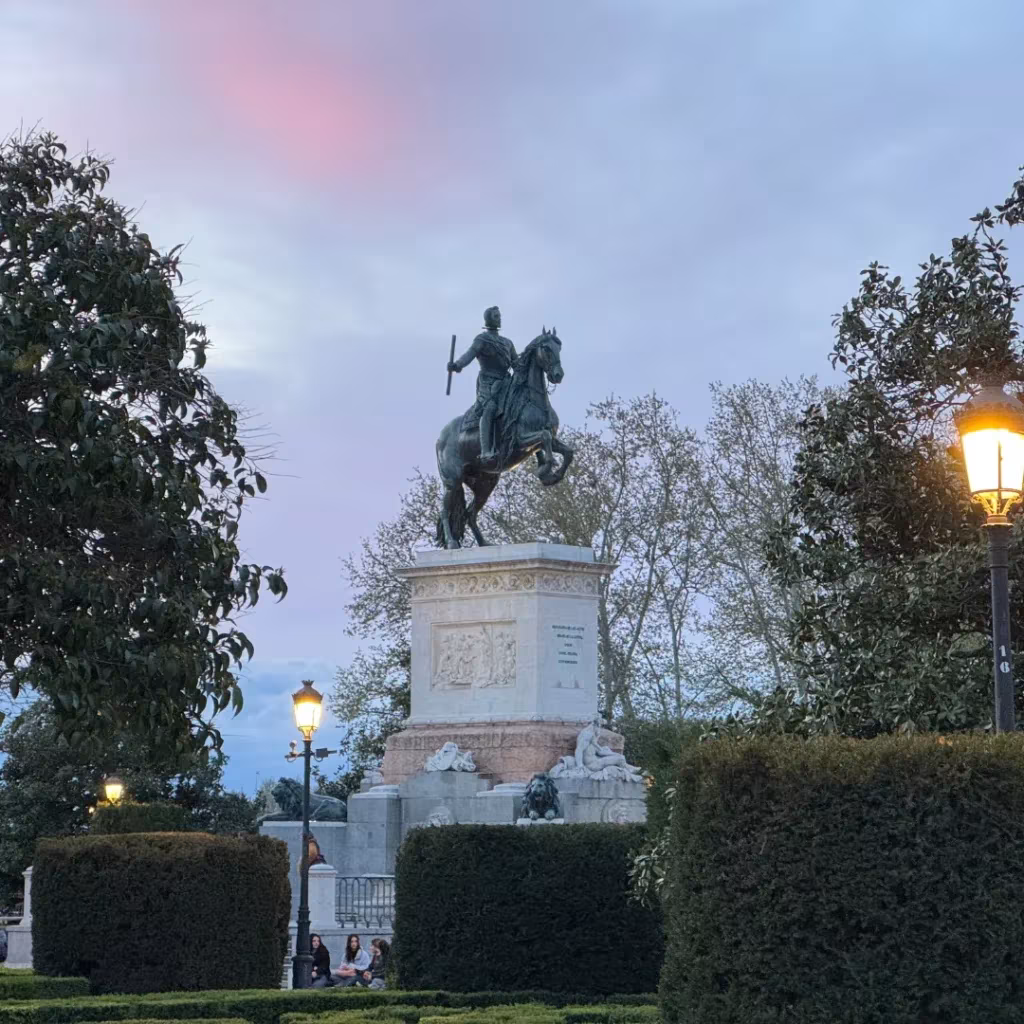 Statue in Plaza de Oriente at night in Madrid, Spain